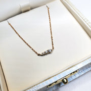 RISE diamond and gold neRise 4 diamond gradating necklace with petite stones and delicate adjustable chain in 14k yellow gold by Dana Walden Bridal in gift boxcklace by DANA WALDEN JEWELRY.