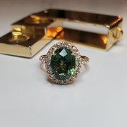 RAYA Green sapphire engagement ring with white diamond halo- handmade & ethical engagement ring by DANA WALDEN NYC.