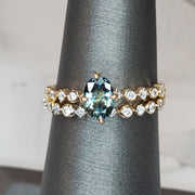 Anais light blue sapphire engagement ring bridal suite paired with matching delicate diamond band by Dana Walden Bridal in NYC