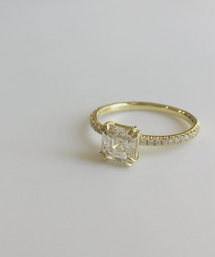 Video of the Asscher engagement ring in yellow gold. By Dana Walden Bridal.