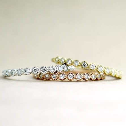 Stack of Arden Diamond Wedding Bands in Tri-Colors by Dana Walden Chin & Rad Chin in NYC