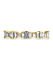 Unique baguette and round diamond wedding band in yellow gold