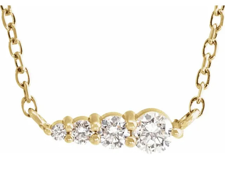 Rise 4 diamond gradating necklace with petite stones and delicate adjustable chain in 14k yellow gold by Dana Walden Bridal
