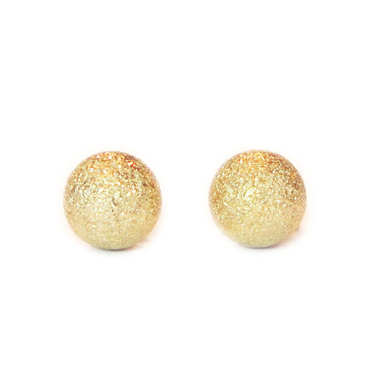 Handmade gold stud earrings by DANA WALDEN NYC