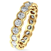 2 carat diamond eternity band 'Gilda' in yellow gold with a scalloped bezel by Dana Walden Bridal nyc - side view
