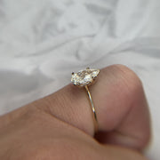 SIDE VIEW- 1.5 carat pear-shaped lab created diamond engagement ring set in yellow gold. DANA WALDEN BRIDAL.