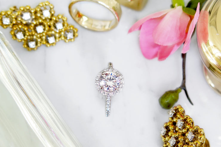 Primrose delicate diamond halo in white gold or platinum with conflict free diamonds 