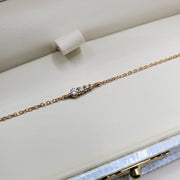 Rise 4 diamond gradating bracelet with petite stones and delicate adjustable chain in 14k yellow gold by Dana Walden Bridal in gift box