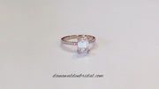 Video of a rose gold emerald cut engagement ring.