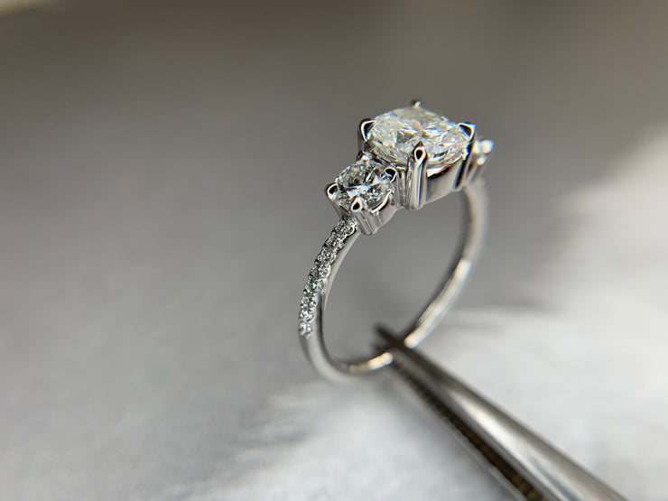 Three stone diamond engagement ring by DANA WALDEN