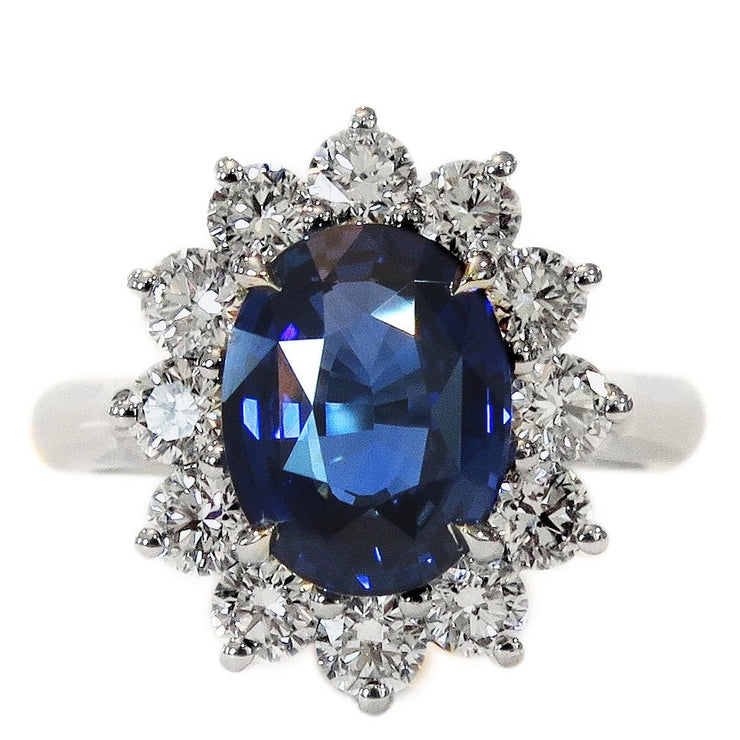 Princess Diana Kate Middleton Sapphire Diamond Halo engagement ring interpretation by DANA WALDEN.