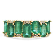 Ethical emerald engagement ring by DANA WALDEN BRIDAL.