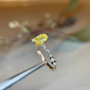 Oval Yellow Sapphire Engagement Ring in Yellow Gold with Diamond Accents & Unique Band in Yellow Gold by Dana Walden Bridal NYC