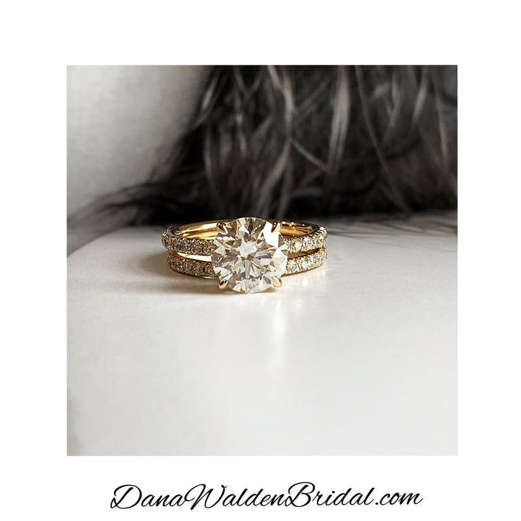 Ellis diamond solitaire engagement ring with a pave wedding band. Dana Walden Bridal in New York City.