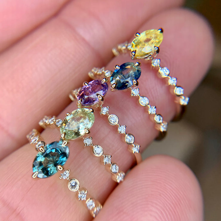 Colored Sapphire Engagement Rings in hues of teal, blue, green, purple, and yellow by Dana Walden Bridal NYC