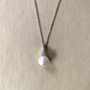 Handmade fine jewelry by Dana Walden Jewelry. White gold, pearl, and diamond necklace ships in 2-3 days.