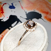 Champagne Diamond Engagement Ring. Natural Cushion cut Champagne diamond with a delicate diamond halo in yellow gold in the box