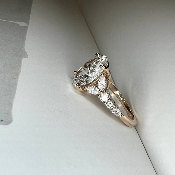 Unique Oval Lab Grown Diamond Engagement Ring With Marquee And Pear Shape Diamonds Accents in Yellow Gold