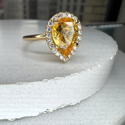 Yellow Sapphire Engagement Ring In Pear Shape Halo and Yellow Gold Side View