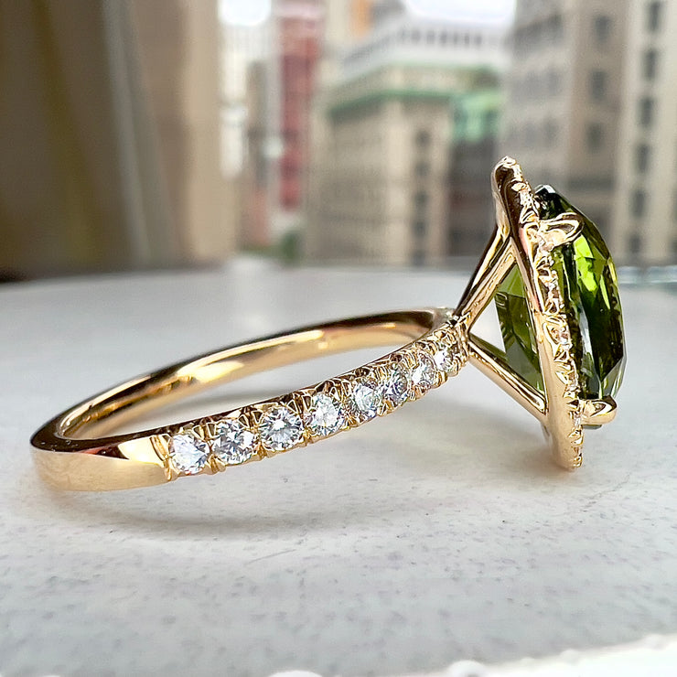 Side View Of Wrenley 5.01 Carat Natural Oval-Cut Green Sapphire Halo Engagement Ring Eco-Friendly 14k Yellow Gold