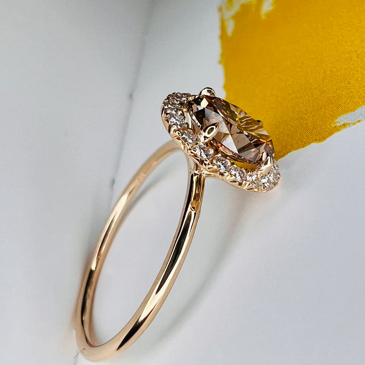 Natural Champagne Diamond Engagement Ring in Yellow Gold with a delicate diamond halo. 