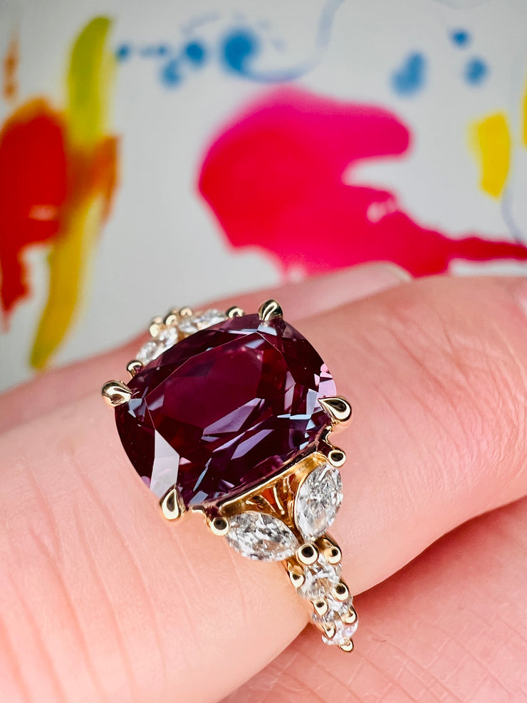 Rossi 2.6 Carat Lab Grown Cushion Cut Alexandrite Engagement Ring Shown On Finger
