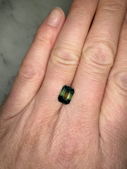 One of a kind natural 2.51 Carat Emerald Cur Bi-color Green Sapphire shown on hand for proportion 