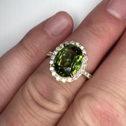 Shown on Finger Wrenley 5.01 Carat Natural Oval-Cut Green Sapphire Halo Engagement Ring Eco-Friendly 14k Yellow Gold