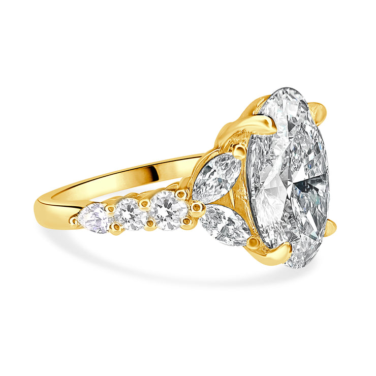 Side View Unique Oval Lab Grown Diamond Engagement Ring With Marquee And Pear Shape Diamonds Accents in Yellow Gold