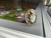 Side View Emilia 1.12ct Natural Oval-Cut Champagne Diamond Halo Engagement Ring Eco-Friendly 14k Yellow Gold