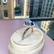 5th Avenue In NYC Showroom Background for Della 3.24ct Natural Oval-Cut Light Blue Sapphire Halo Engagement Ring Eco-Friendly Platinum