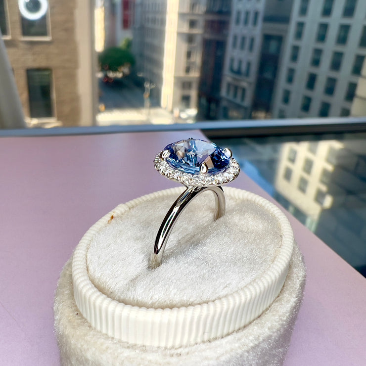 5th Avenue In NYC Showroom Background for Della 3.24ct Natural Oval-Cut Light Blue Sapphire Halo Engagement Ring Eco-Friendly Platinum