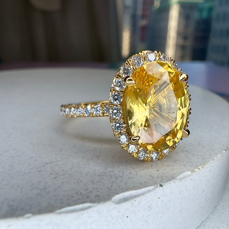 3/4 view Andaz 4.61 Carat Natural Oval-Cut Yellow Sapphire Halo Engagement Ring Eco-Friendly 18k Yellow Gold