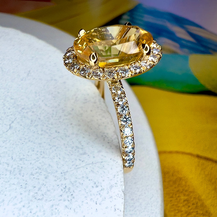 side view of Andaz 4.61 Carat Natural Oval-Cut Yellow Sapphire Halo Engagement Ring Eco-Friendly 18k Yellow Gold