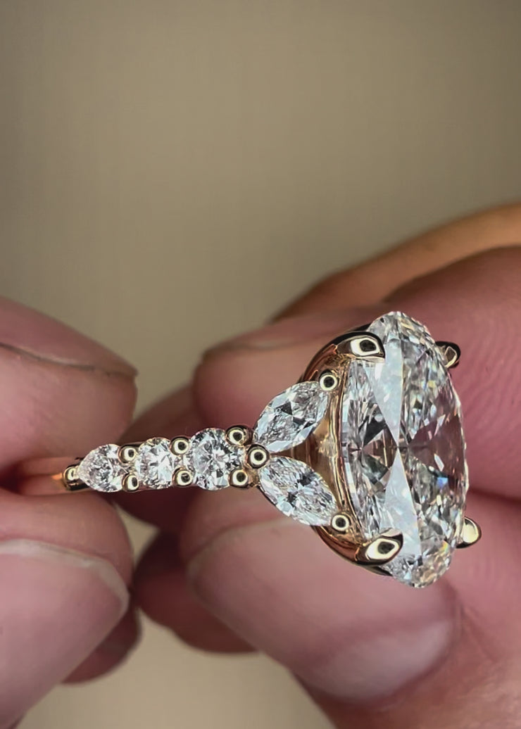 Video Unique Oval Lab Grown Diamond Engagement Ring With Marquee And Pear Shape Diamonds Accents in Yellow Gold