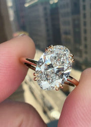 Video of the Jessa Delicate 2 Carat Lab Grown Oval Diamond Engagement Ring with Hidden Halo in Yellow Gold with double claw prongs - Designed for a wedding band to sit flush NYC 