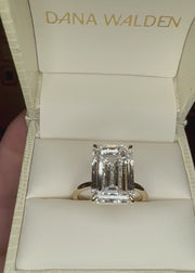 Silas - 9 Carat Emerald Cut Lab Grown Diamond Engagement Ring shown on hand Video In Ring Box