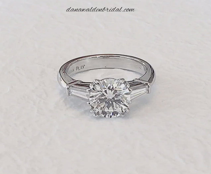 Video of Conflict-free round diamond engagement ring with baguette diamond accents. Made in New York City.
