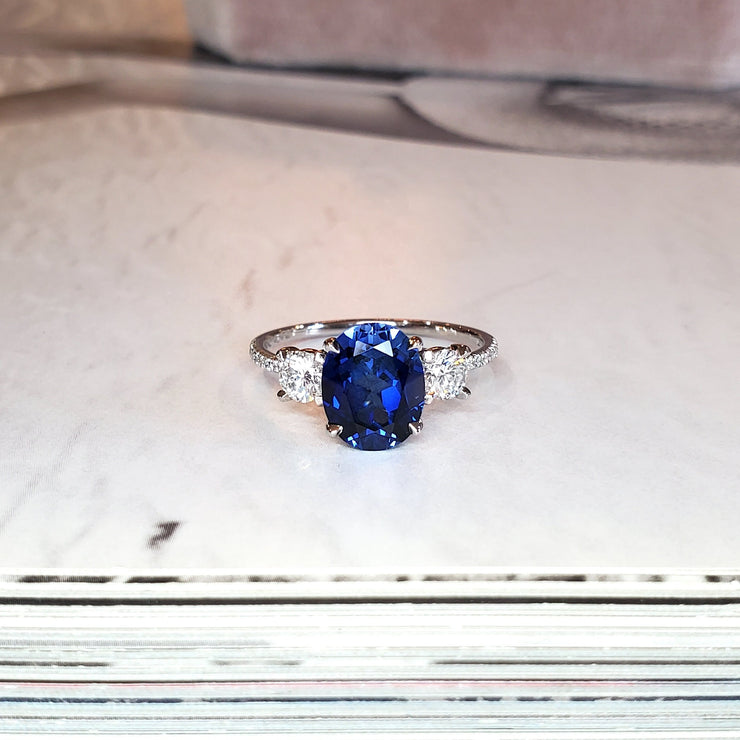 Oval blue sapphire engagement ring with diamond accents- Dana Walden Bridal NYC