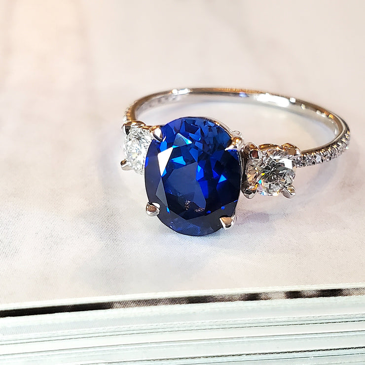 Oval blue sapphire engagement ring with diamond accents- Dana Walden Bridal NYC