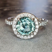 Elsa 1.71ct Blue-Green Sapphire Engagement Ring with White Diamond Halo