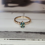 Minimalist aqua sapphire engagement ring by DANA WALDEN BRIDAL.
