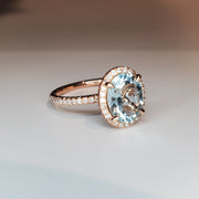 Oval aquamarine with ethical diamond halo by DANA WALDEN BRIDAL.