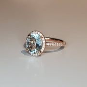 Oval aquamarine with ethical diamond halo by DANA WALDEN BRIDAL.