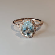 Oval aquamarine with ethical diamond halo by DANA WALDEN BRIDAL.