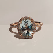 Oval aquamarine with ethical diamond halo by DANA WALDEN BRIDAL.