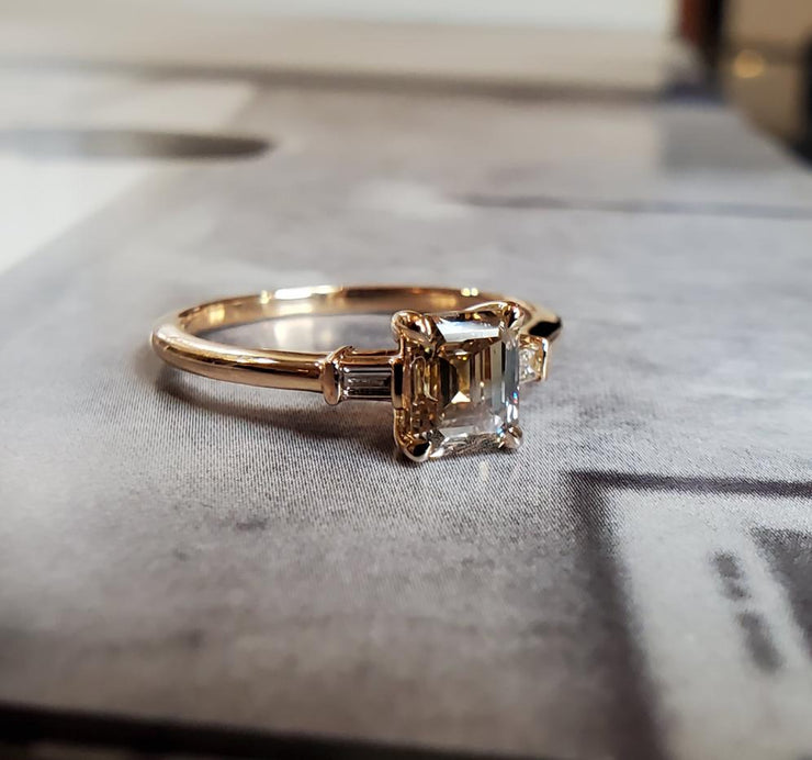 Emerald-cut champagne diamond engagement ring- three stone ring with ethical accent diamonds by DANA WALDEN BRIDAL NYC.