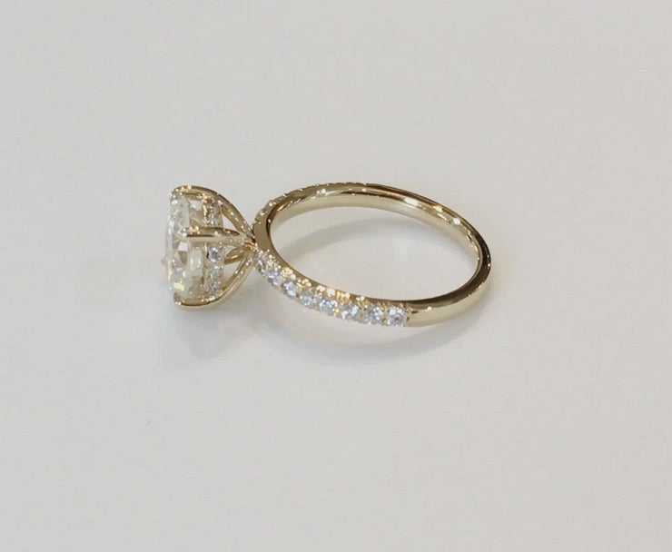 Video of an ethically handmade diamond solitaire engagement ring by Dana Walden Bridal in NYC.