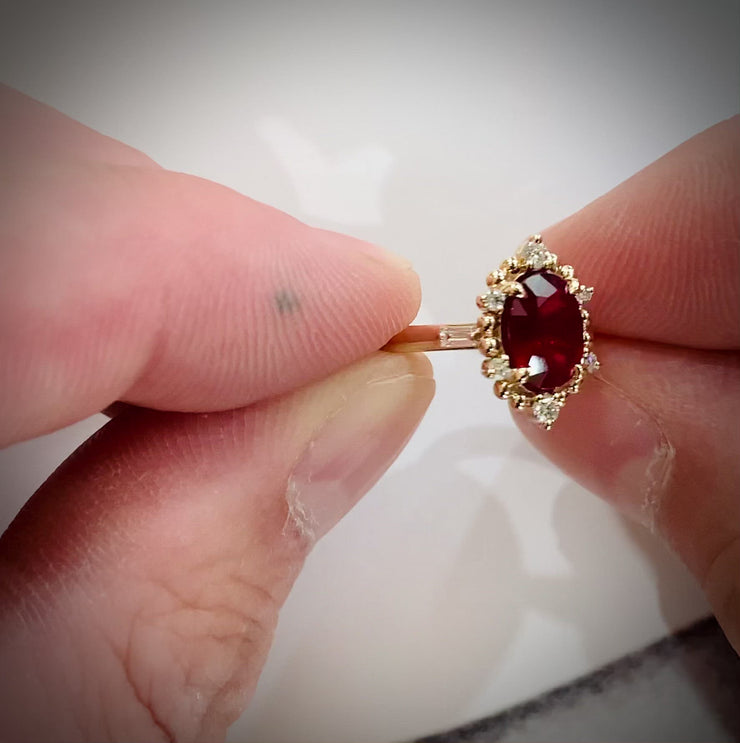 Handmade ruby ring with gold bead and diamond halo. DANA WALDEN BRIDAL, NYC.