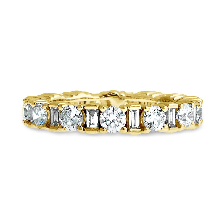 Eternity engagement band with prong-set round and baguette diamonds set in Yellow Gold. Handmade by Dana Walden Jewelry.